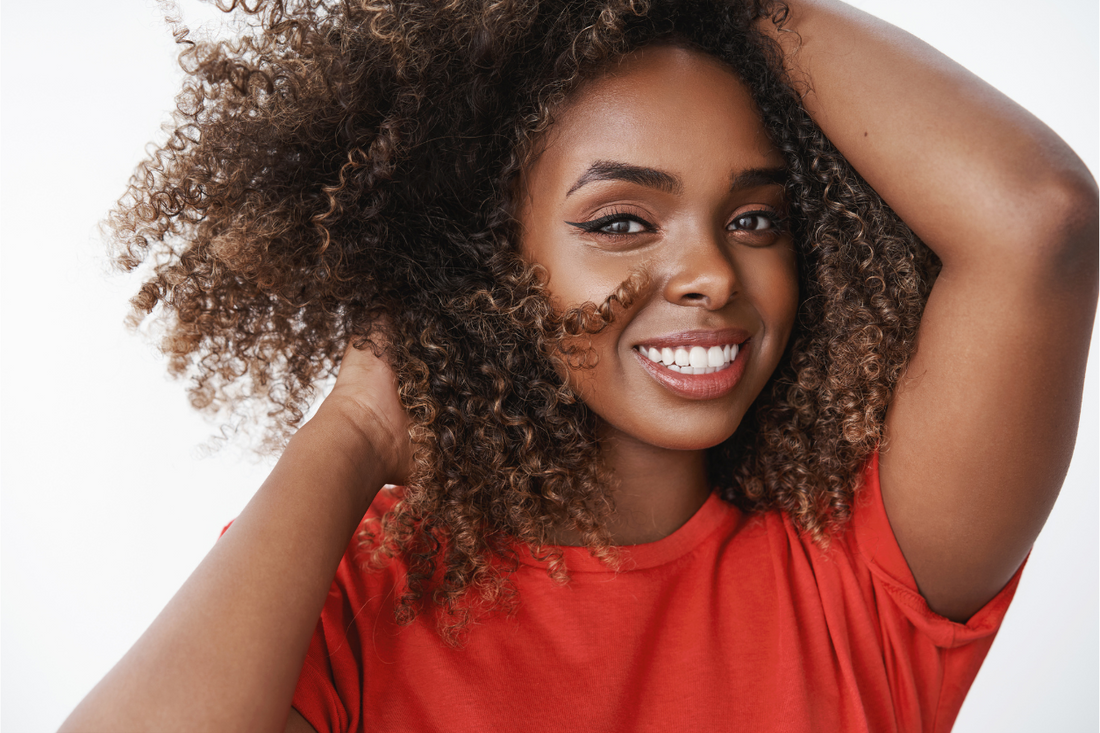 woman-with-natural-hair-smiling