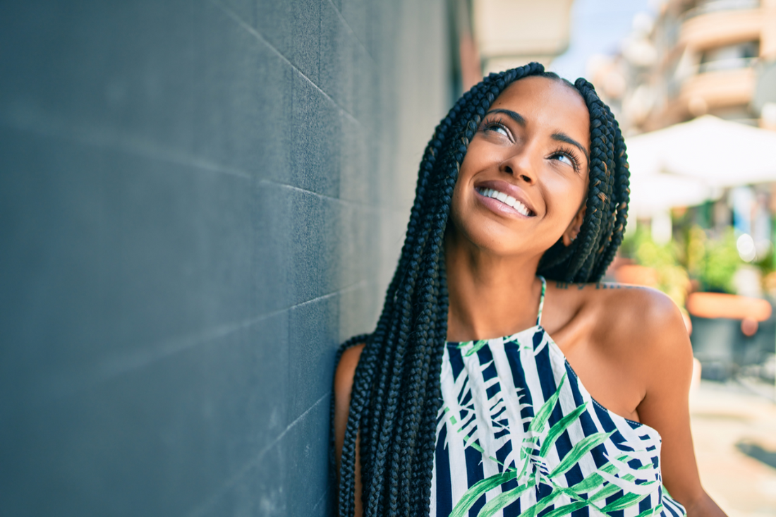 young-women-posing-outdoors-summer-braids-concept