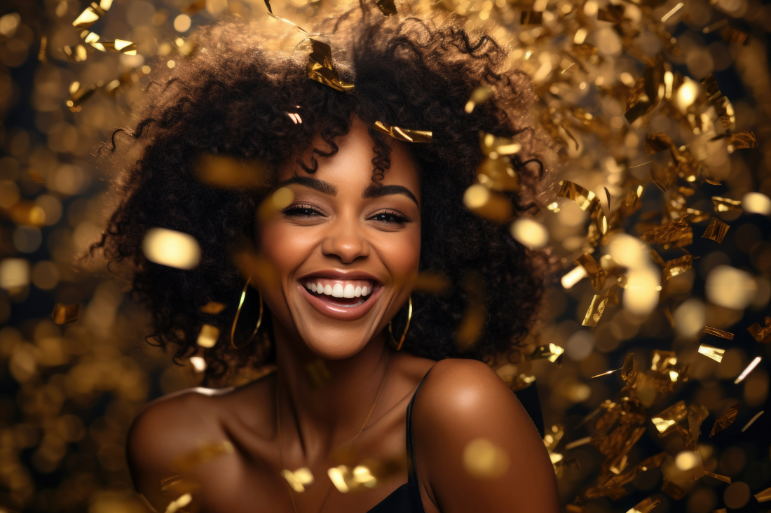 Beautiful african american woman with curly hair having fun in the party