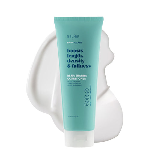 RevAir rejuvenating conditioner product bottle, with some product smeared to show creamy texture