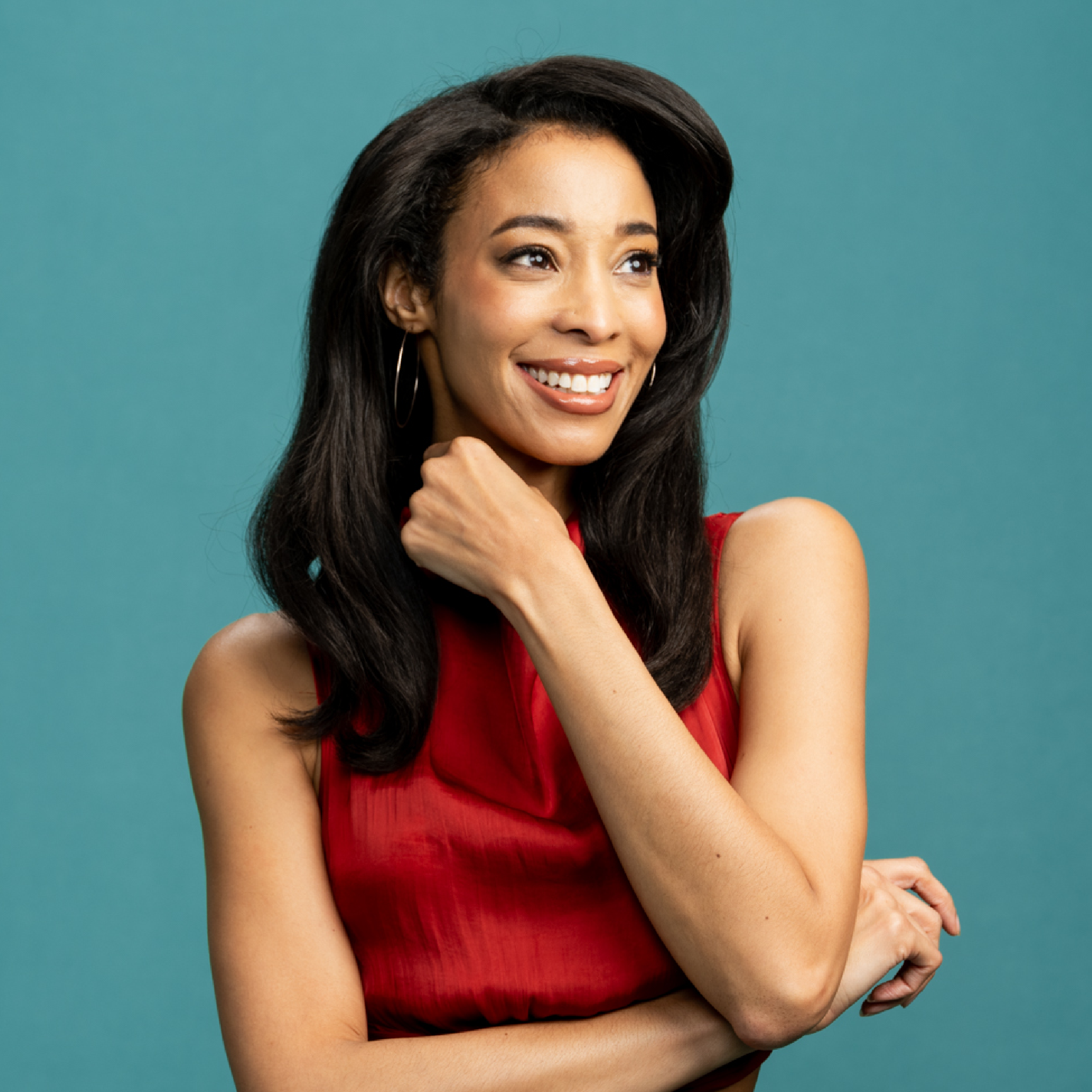 Smiling woman with stretched, shinier hair