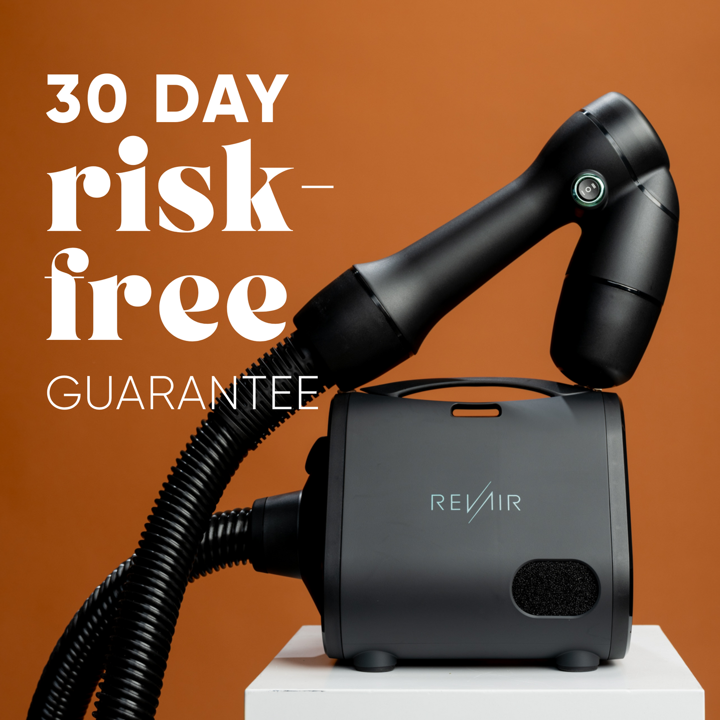 RevAir Reverse-Air Dryer with 30 Day Risk-Free Guarantee promotional image against orange background.