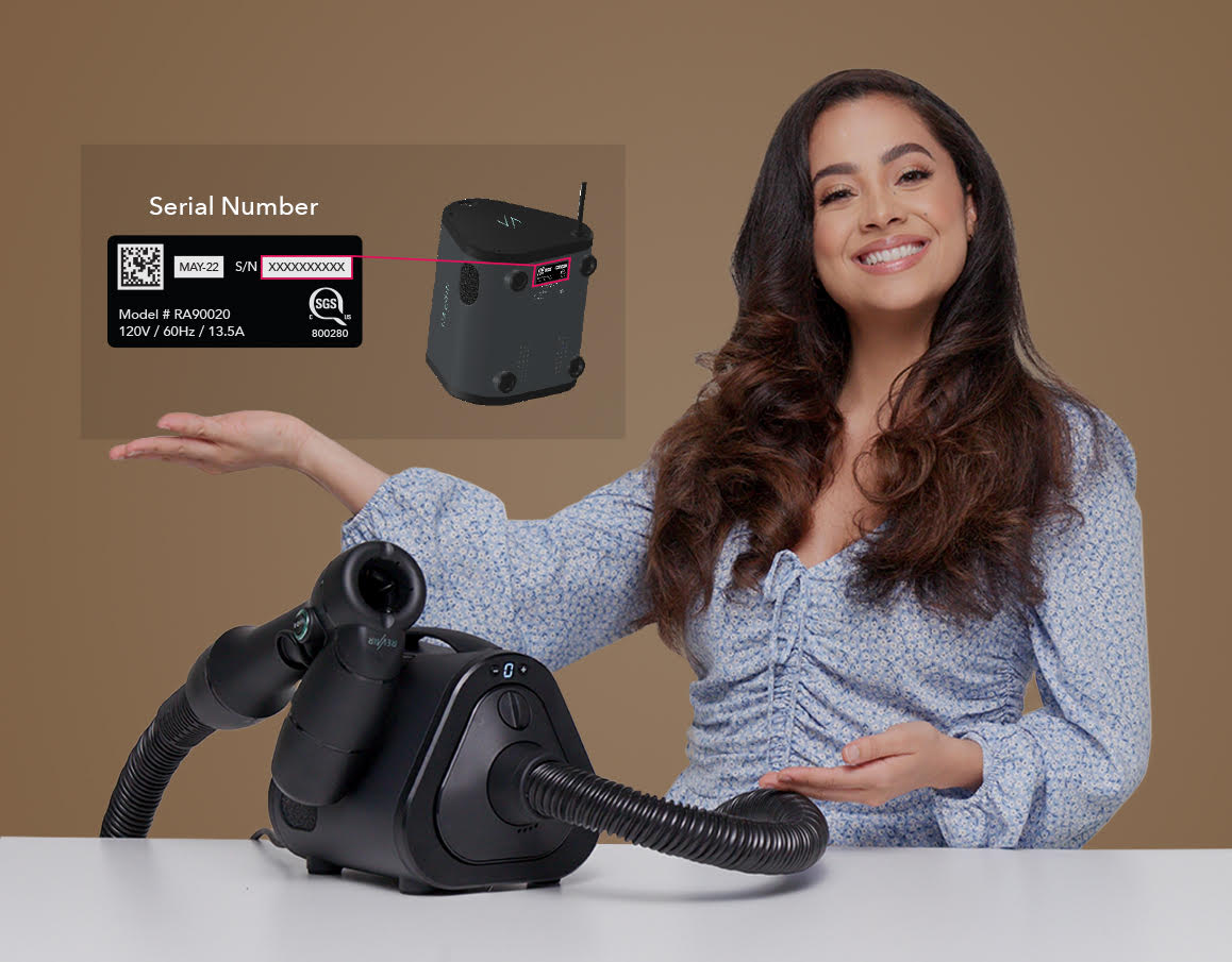 Woman showing where to find serial number on bottom of RevAir device
