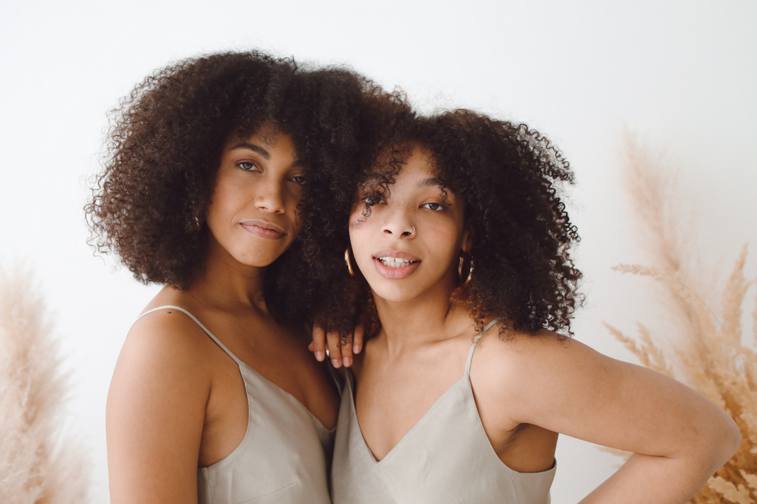 two women with beautiful textured hair