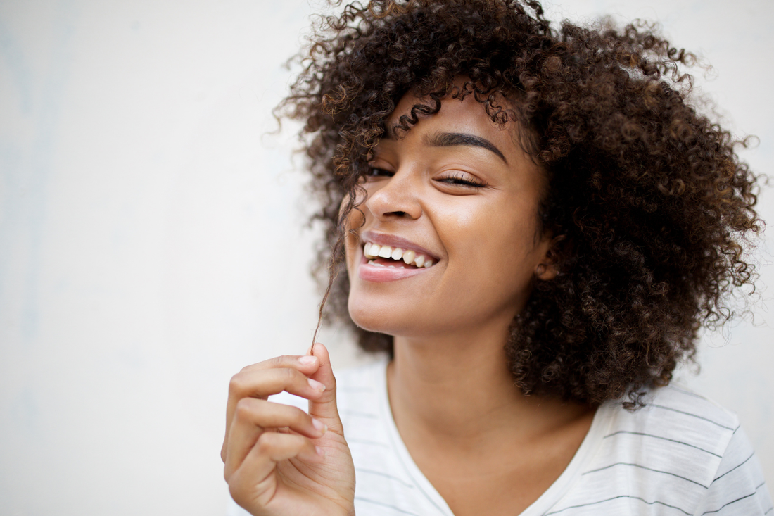 Healthy curls showing results of a consistent hair care routine