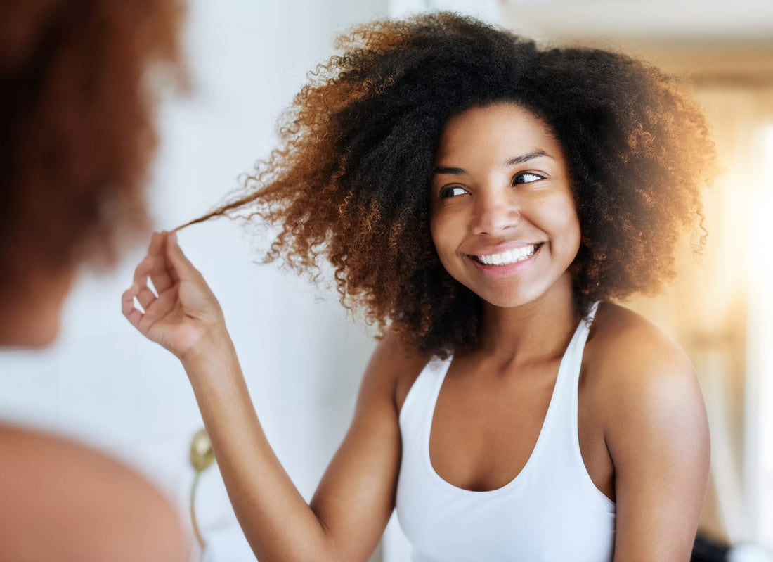 Smiling woman with beautiful curly hair