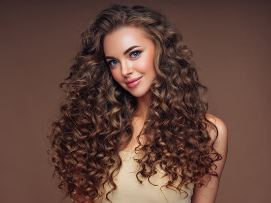 woman-with-healthy-curly-hair-detangling-hair-concept