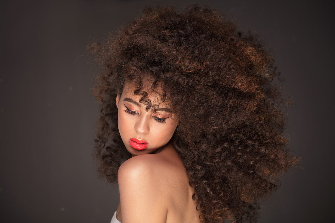 woman-with-long-afro-hairstyle-and-glamour-makeup-hair-grow-faster-concept