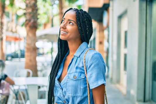 woman-with-protective-styles-while-walking-at-the-city