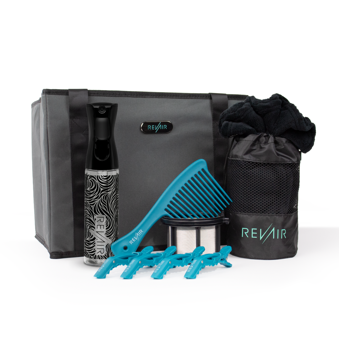 Revair grooming kit with gray bag, spray bottle, comb, and clips on a white background