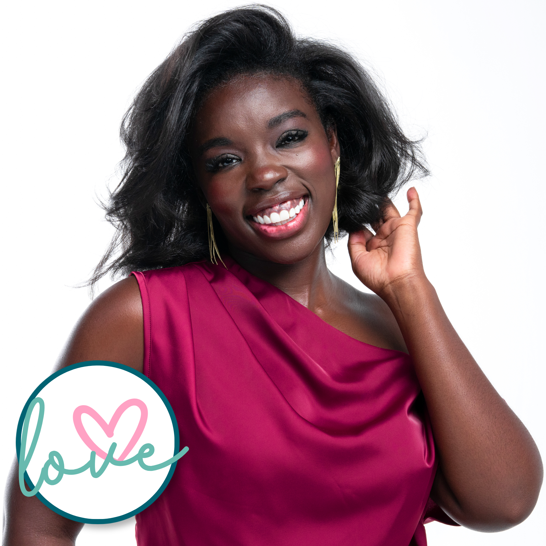Woman smiling with voluminous, smooth black hair styled with soft curls and body.