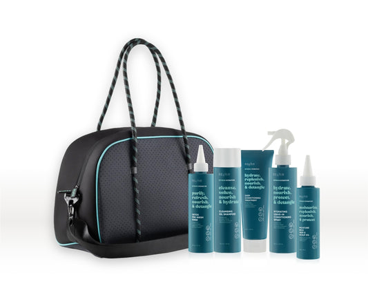Hydration Haul showing weekender bag and five extreme hydration haircare products