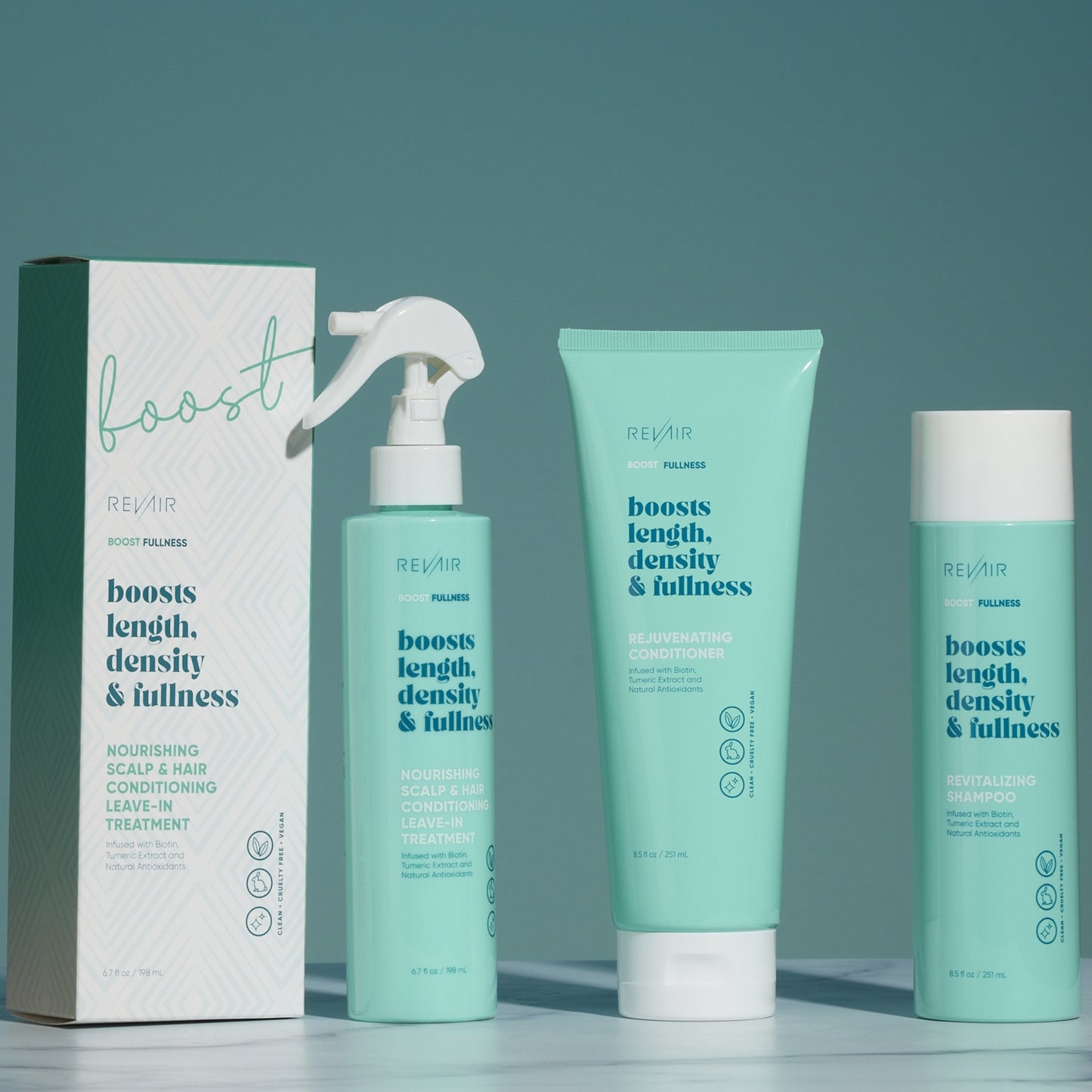 Group of various RevAir boost fullness hair care product bottles