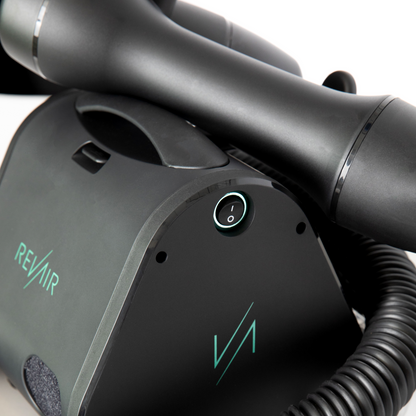 Black RevAir hair dryer with REVAIR branding on a white background