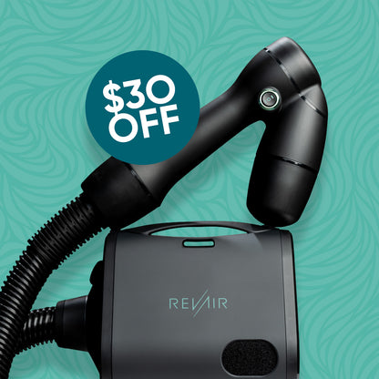 RevAir Reverse-Air Hair Dryer with 'Revair' branding on a teal background, featuring a $30 off label.