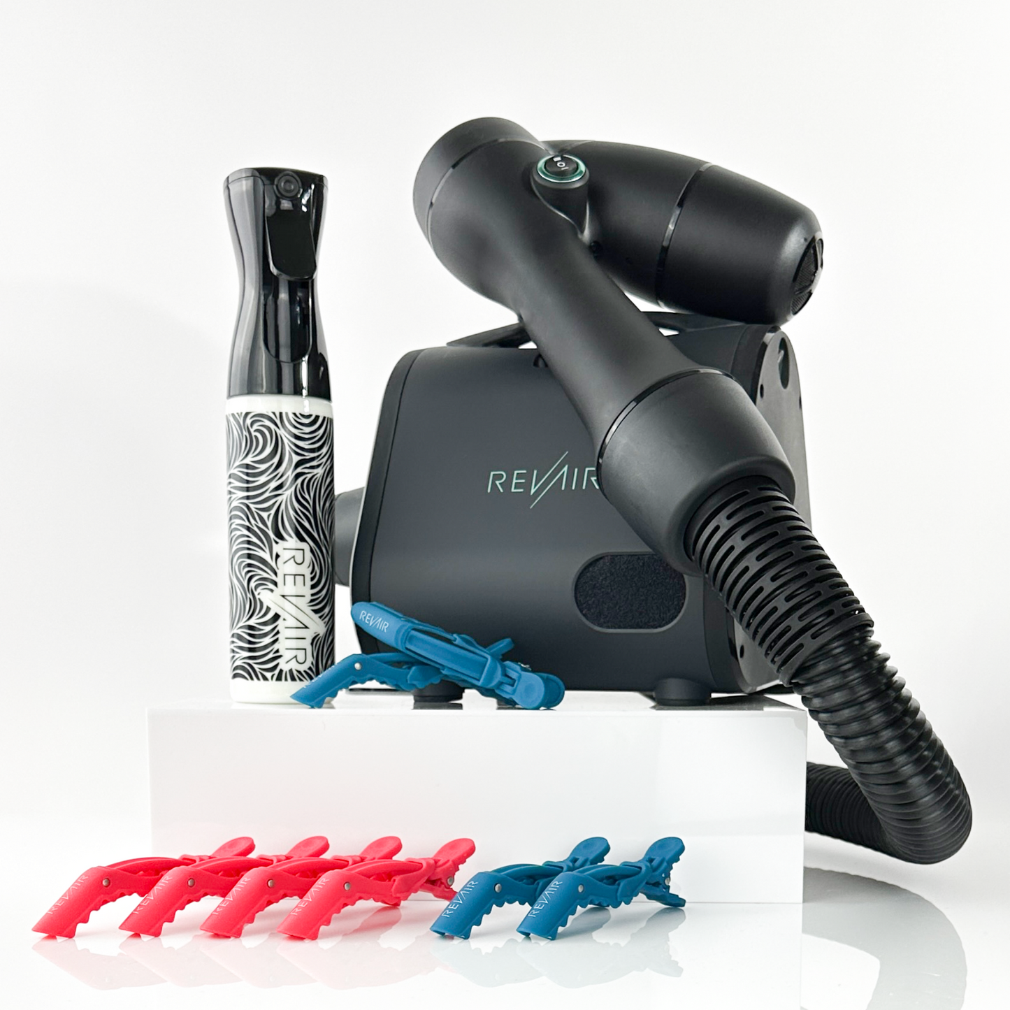 Revair hair styling tool with accessories on a white background