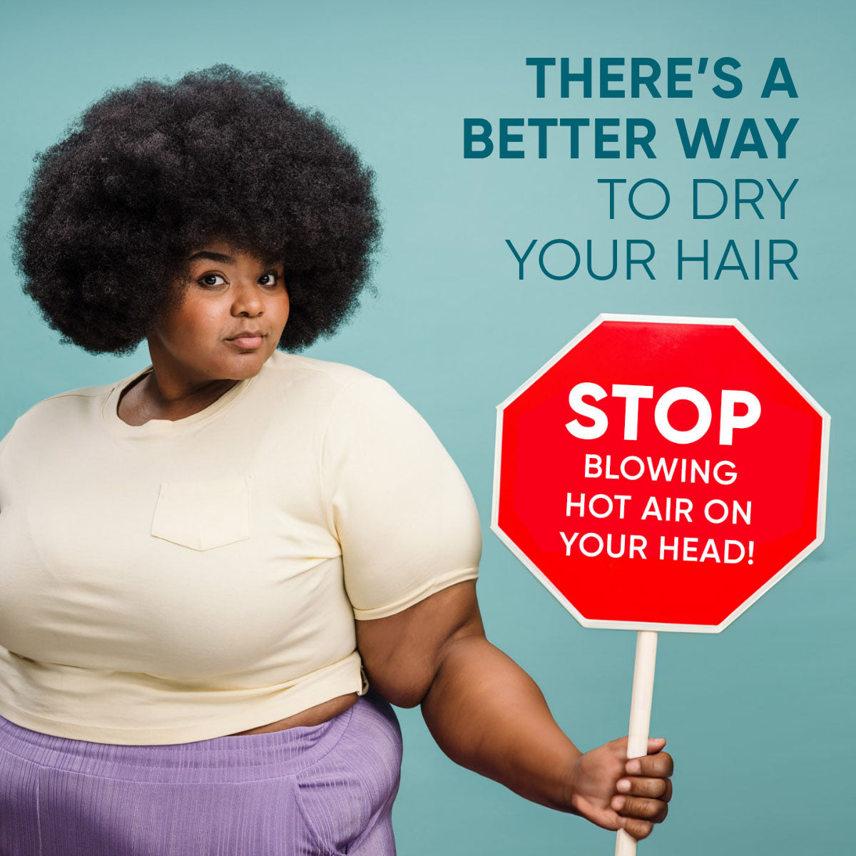 There's a better way to dry your hair: woman holding a stop sign with the words Stop blowing hot air on your head