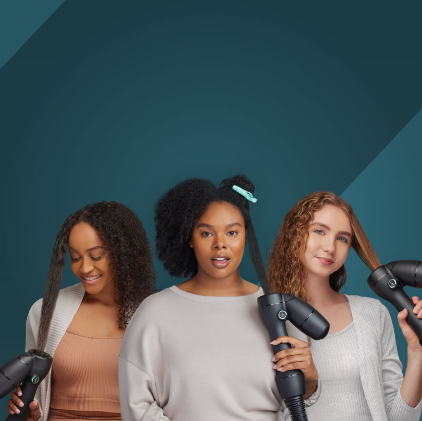 Diverse group of women using the RevAir Reverse-Air Hair Dryer on their hair